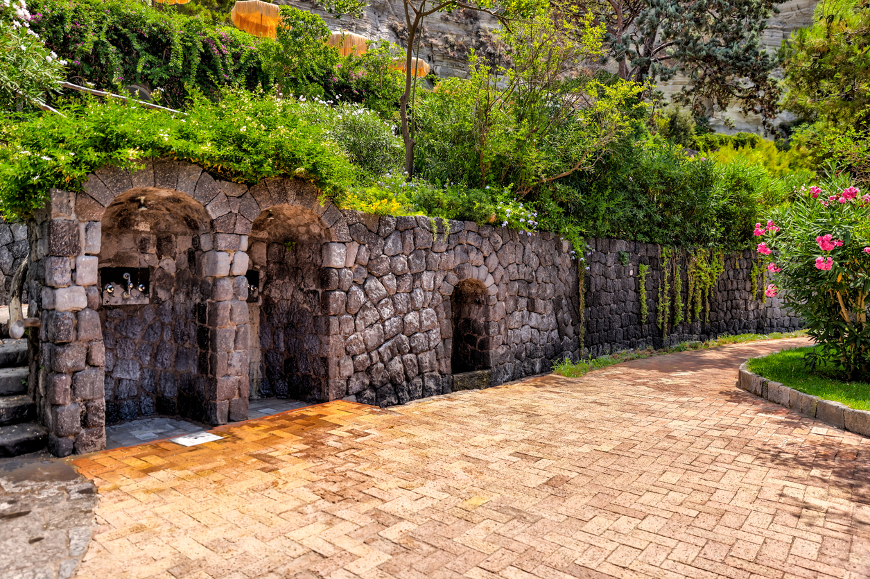 Rustic stairs and pathways amongst the hot springs on the island of Ischia in Italy